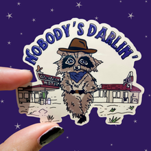 Load image into Gallery viewer, Cowboy Raccoon &quot;Nobody&#39;s Darlin&#39;&quot; Water Bottle Sticker
