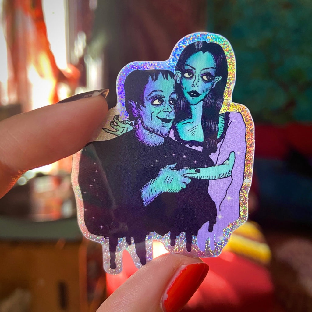 Big Eyed Lily Munster and Herman Munster Rainbow Glitter Water Bottle Sticker