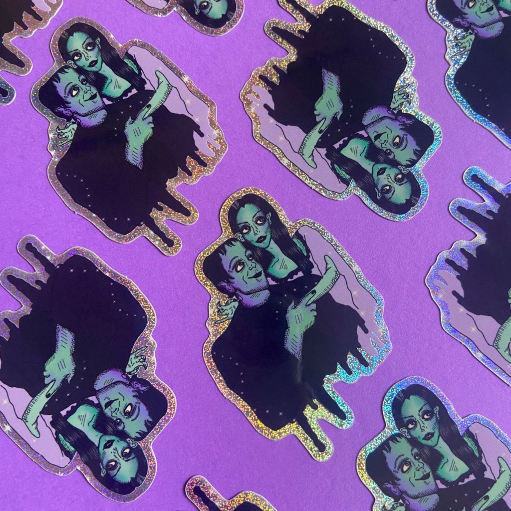 Big Eyed Lily Munster and Herman Munster Rainbow Glitter Water Bottle Sticker