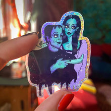 Load image into Gallery viewer, Big Eyed Lily Munster and Herman Munster Rainbow Glitter Water Bottle Sticker
